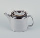 Knabstrup, 
Denmark, 
stoneware 
teapot with 
gray and brown 
glaze tones.
From the 
1970s.
Perfect ...
