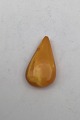 Droplet-shaped 
Amber "Pendant" 
Measures 4.2 cm 
(1.65 inch) 
Weight 6.1 gr / 
0.22 oz 
(Pre-drilled)