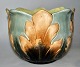 Majolica art 
nouveau flower 
pot hides, 
approx. 1900, 
Germany. 
Polychrome 
decorated. H.: 
16 cm. ...