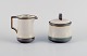 Bing & 
Grøndahl, Tema, 
a creamer and a 
sugar bowl in 
stoneware.
From the 
1970s.
Marked.
In ...