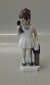 73 Lyngby girl 
with phone " 
Gitte" 18 cm 
Marked with a 
Royal Crown 
Handpainted, 
Copenhagen Made 
...