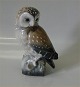80 Lyngby bird: 
Owl 17 cm 
Marked with a 
Royal Crown 
Handpainted, 
Copenhagen Made 
in Denmark. The 
...