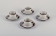 Arabia, 
Finland. 
"Karelia". Four 
sets of small 
coffee cups and 
saucers in 
stoneware.
From the ...
