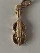 Violin Pendant 
#14 carat Gold
Stamped 585
Height 26,17 
mm
Width 7,67 mm
Nice and well 
...