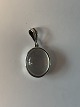 Pendant with 
moonstone 
Sterling silver
Stamped 925S
Height 27.5 mm 
with the ring
Width 14.51 
...