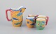 Vietri, Italy. 
Set of four 
large mugs and 
a large pitcher 
in ceramic. 
Decorated with 
fish and ...