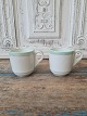 Pair of French 
café brûlot 
cups in strong 
iron porcelain 
decorated with 
green and gold 
stripes ...