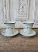 Pair of French 
café brûlot 
cups in strong 
iron porcelain 
decorated with 
green stripes 
and the ...
