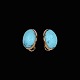 Danish 14k Gold 
Ear Clips with 
Cabochon 
Turquoise.
Stamped with 
14k.
1,7 x 1,3 cm. 
/ 0,67 x ...