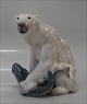 Dahl Jensen 
1272 Polar bear 
with fish (LJ) 
18 cm CoD
 Marked with 
the royal Crown 
and DJ ...