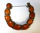 Latvia. Stamped 
WL. Gold-plated 
silver bracelet 
with amber. 
(875). Several 
amber pieces 
have ...