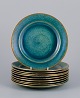 Josef Ekberg 
for 
Gustavsberg, 
Sweden. A set 
of ten ceramic 
plates with 
glaze in 
blue-green 
tones ...