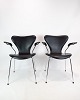 The 7 with 
armrests and 
fully 
upholstered 
leather is a 
classic design 
by Arne 
Jacobsen. This 
...
