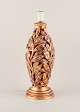Large Italian 
ceramic table 
lamp. Shaped 
like branches 
with gold 
decorations.
1970/80s
Stamped ...