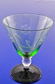 Kastrup 
glasswork from 
1938.  
"Lis" green 
white wine 
glass on black 
foot. Height 
10.3 cm. 4 ...