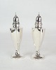 A pair of salt 
and pepper 
shakers of 
simple design, 
stamped 
Hamilton 
Sterling, 
number 210. ...