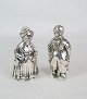 Salt and pepper 
shaker in 
silver, stamped 
830, designed 
as a man and a 
woman. Weight: 
325g
H:12 ...