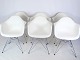 Dining room 
chairs, Model 
DAR, designed 
by Charles & 
Ray Eames made 
by Vitra in 
white hard ...