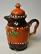 Small ceramic 
coffee pot, 
19th century 
Schleswig - 
Holstein. 
Polychrome 
decorated with 
tendrils ...