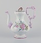 Emile Gallé 
(style of). 
Large coffee 
pot in faience 
with motifs of 
flowers and ...