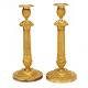 Pair of fire 
gilt Empire 
bronze 
candlesticks
France circa 
1820
H: 34cm