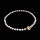 Ole Lynggaard. 
Pearl Necklace 
with 14k Gold & 
White Gold Ball 
Clasp.
Freshwater 
Cultured Pearl 
...