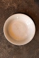 Old Swedish 
cream colored 
earthenware 
bowl with pearl 
edge from 
Gustavsberg 
with a fine 
patina. ...
