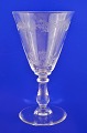 Wine glass with 
guilloche 
decoration on 
the bowl. 
Height 18 cm. 
Diameter 10 cm. 
Fine condition. 
...