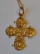 14 carat Dagmar 
cross, 25 x 21 
mm. 20th 
century 
Denmark. 
Stamped. With 
14k gold chain. 
L.: 43 ...