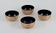 Four Asian 
bowls made of 
papier-mâché. 
Decorated in 
gold and black 
with 
traditional ...