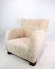 Danish 
cabinetmaker 
white coloured 
shearling - 
sheepskin 
1940's lounge 
chair. A modern 
classic ...