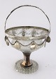 Glass stand 
with silver 
mounting with 
Danish and 
Norwegian 
silver 8 
skillings.