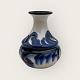Cow horn 
painted 
pottery, Vase 
with blue and 
white glaze, 
No. 558, 9cm in 
diameter, 10cm 
high ...