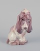 Dahl Jensen 
porcelain 
figurine of a 
sitting Basset 
Hound.
Model: 1065.
From the 
1930s.
In ...