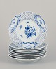Meissen, 
Germany. A set 
of eight open 
lace Blue Onion 
plates, adorned 
with 
hand-painted 
flower ...