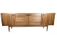 Christian 
Linneberg made 
a low sideboard 
that is 
veneered with 
rosewood. It 
has four 
sliding ...