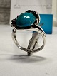 Vintage 
sterling silver 
finger ring 
with genuine 
turquoise size 
56 A round 
turquoise stone 
in ...