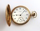 Elgin, USA. 
Multicolored 
gold pocket 
watch in 14K 
(585). Diameter 
50 mm. Well 
maintained, but 
...