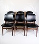 A set of six 
faux leather 
dining chairs, 
designed and 
manufactured by 
a Danish master 
teak ...