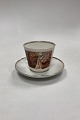 Bing and 
Grondahl 
Antique Coffee 
Cup with KPM 
Saucer. 
Hairline crack 
on the inside 
of the cup. ...