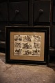 Decorative, old 
print / 
engraving with 
different 
breeds of dogs, 

framed in an 
old black 
wooden ...
