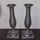 Pair of 
baluster-shaped 
candlesticks in 
pewter on a 
square base. 
20th century. 
In good 
condition ...