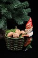 Old painted 
terracotta elf 
with a wicker 
basket for 
nuts, Christmas 
sweets or for a 
block ...