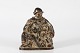 Jais Nielsen 
and Royal 
Copenhagen
Stoneware 
figurine model 
no. 20097 with 
motif
"The good ...