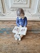 B&G figure - 
girl with 
Christmas book 
No. 2247, 
Factory first 
Height 11.5 
cm. 
Design: ...