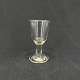 Height 9 cm.
The glass has 
is clipped 
underneath and 
fine lines in 
the thick 
glass.
It is ...