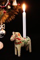 Decorative, old 
Swedish Dalar 
horse in 
off-white 
painting with 
room for a 
small Christmas 
candle ...