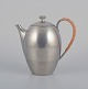Just Andersen, 
early Art Deco 
coffee pot in 
pewter, handle 
in wicker work.
Model ...