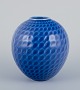 Maria 
Torstensson for 
Royal 
Copenhagen, 
porcelain vase 
with glaze in 
blue shades. 
Drop-shaped ...