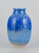 Sevres, France. 
Large unique 
porcelain vase 
with crystal 
glaze in blue 
shades.
Unique piece 
...